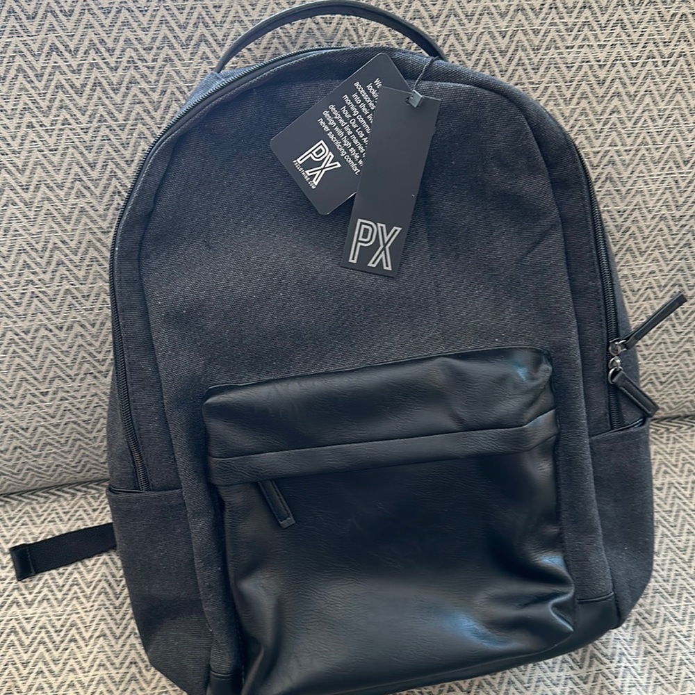 Beautiful Landon backpack. vegan leather and canvas. Padded laptop sleeve. NWT